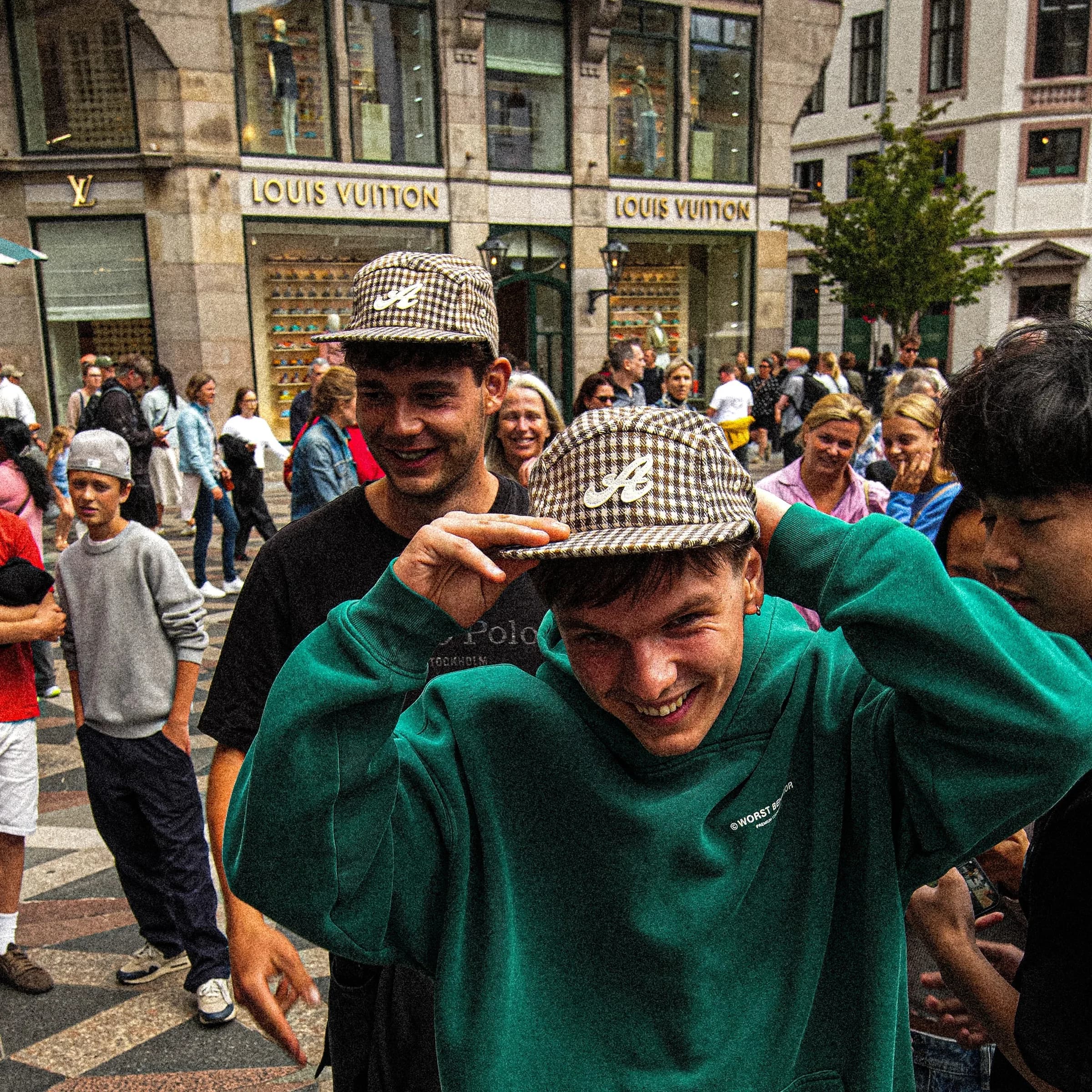 Two friends in Shopakid caps on Strøget, Copenhagen